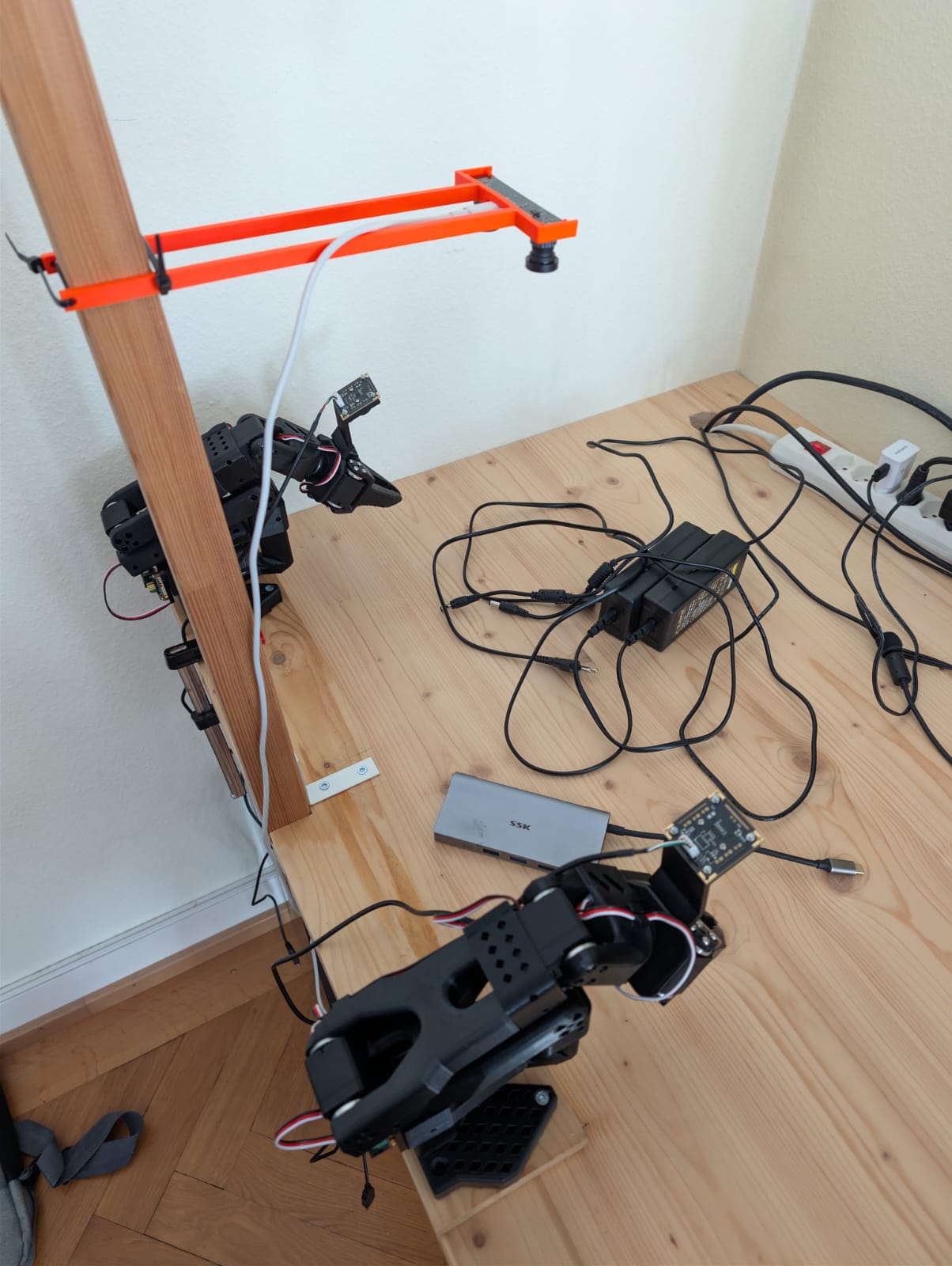Home lab bimanual setup with two SO-101 arms and overhead camera